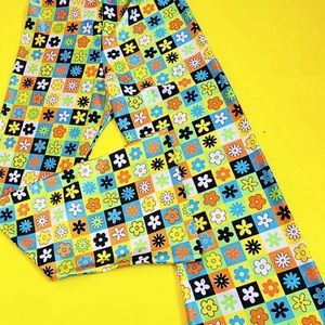 Groovy Gal “Floral Groove Flares” size M